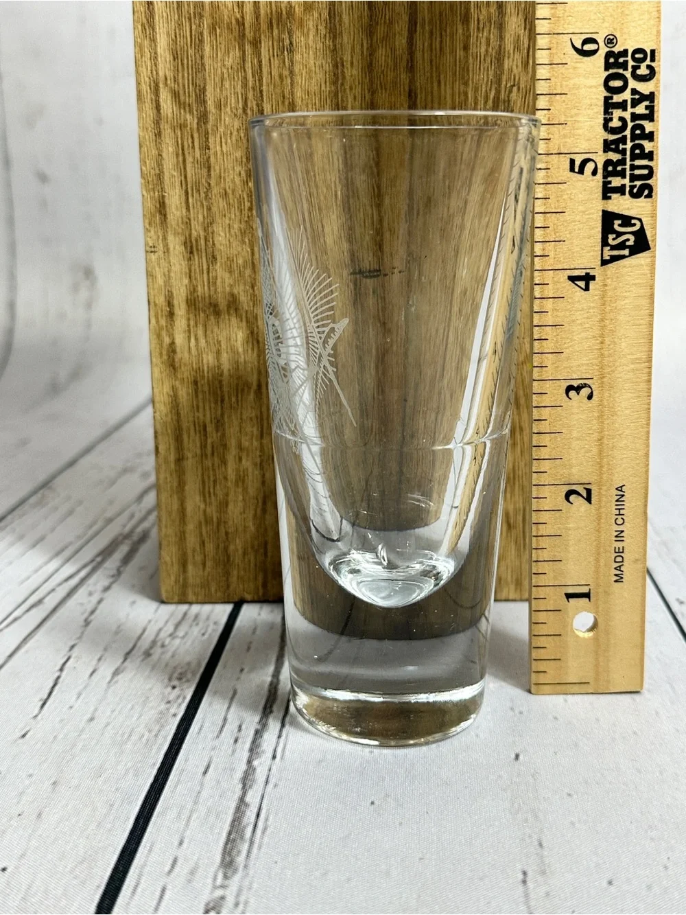 Masonic shot glass featuring laser-etched emblems of Freemasonry